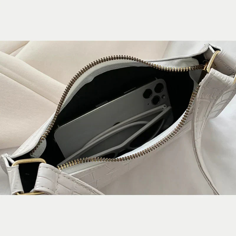 Tilly - Błyszcząca torebka crossbody z nadrukiem krokodyla