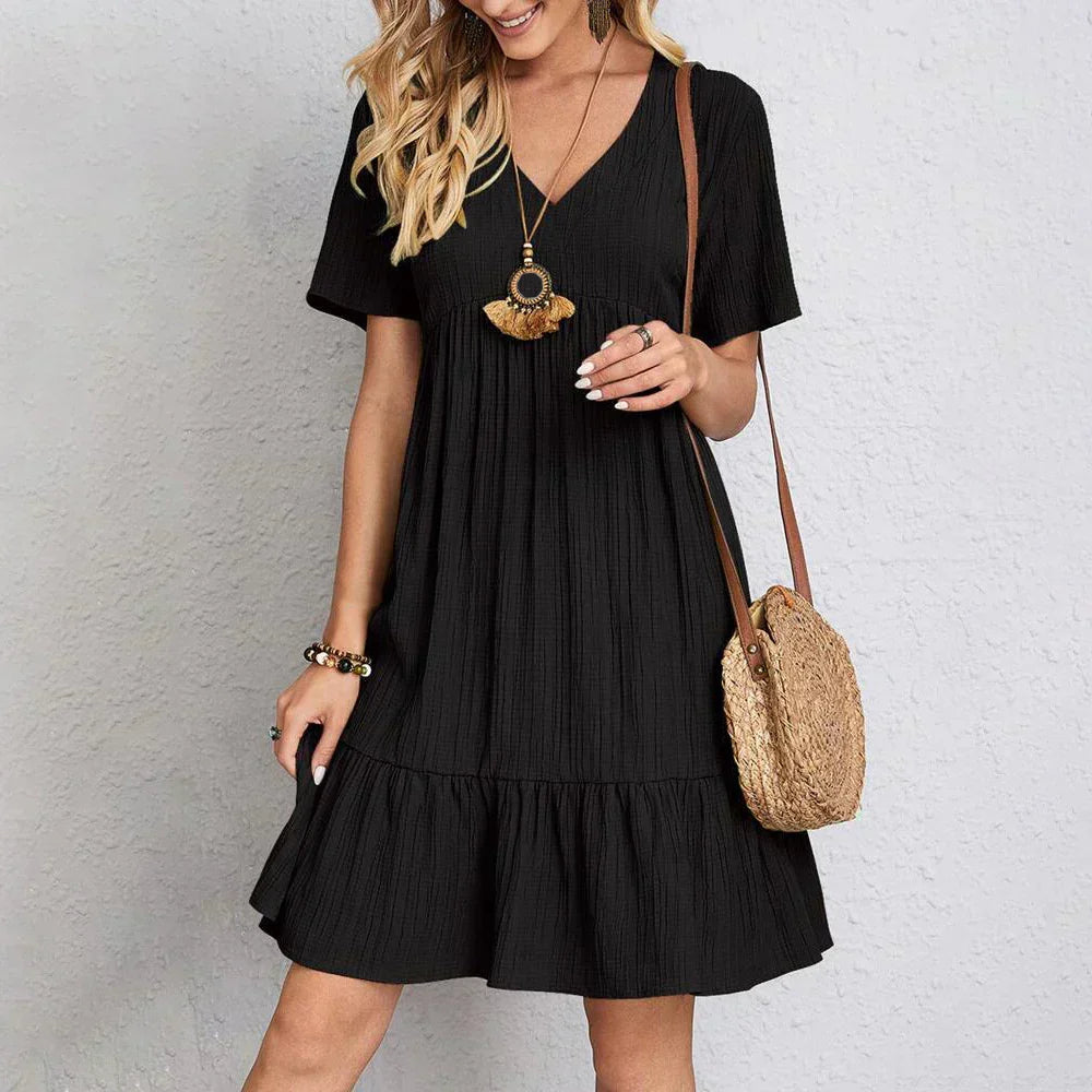 Audrey - Modna mini sukienka w stylu boho z falbaną u dołu