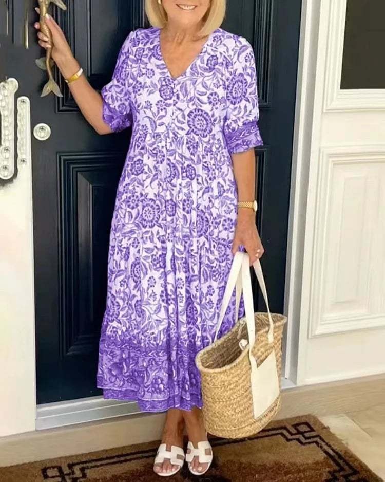 Mavis - Elegancka sukienka z długim rękawem, dekoltem w szpic i kwiatowym wzorem w stylu boho
