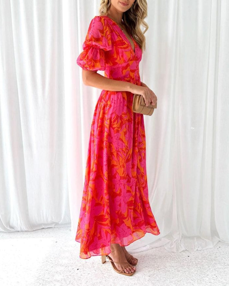 Clara – Elegancka sukienka maxi z dekoltem w szpic i bufiastymi rękawami