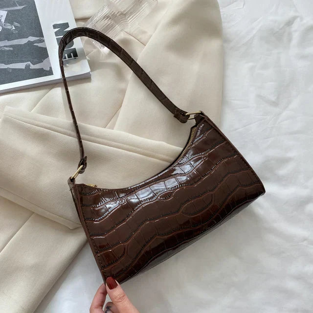 Tilly - Błyszcząca torebka crossbody z nadrukiem krokodyla