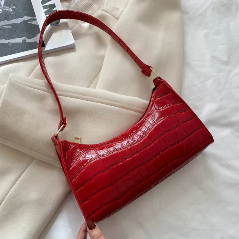 Tilly - Błyszcząca torebka crossbody z nadrukiem krokodyla