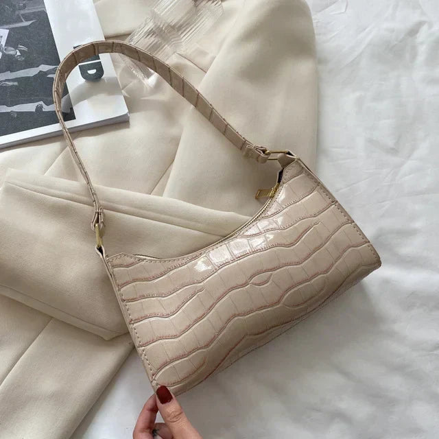 Tilly - Błyszcząca torebka crossbody z nadrukiem krokodyla