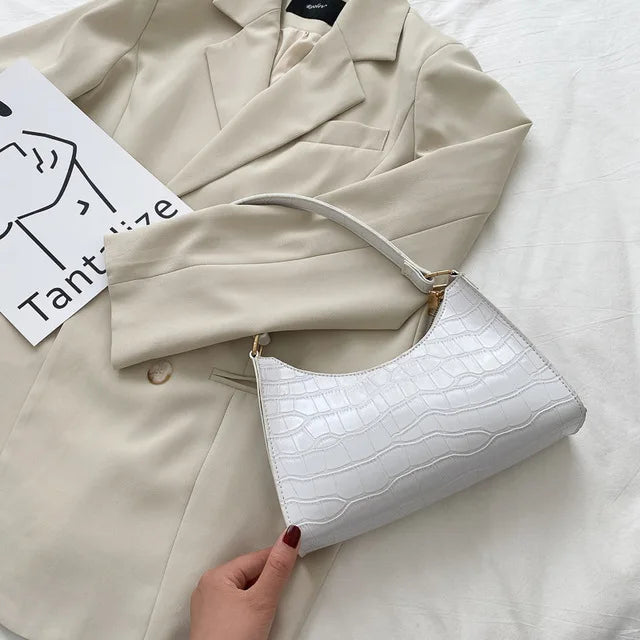 Tilly - Błyszcząca torebka crossbody z nadrukiem krokodyla