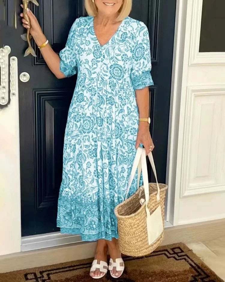 Mavis - Elegancka sukienka z długim rękawem, dekoltem w szpic i kwiatowym wzorem w stylu boho
