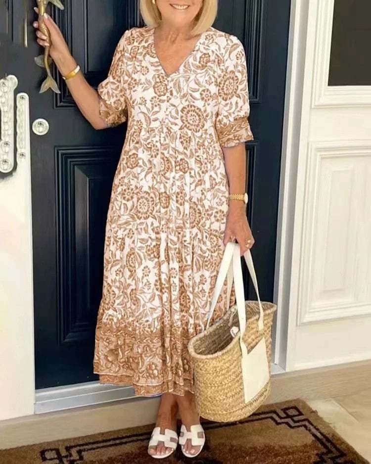 Mavis - Elegancka sukienka z długim rękawem, dekoltem w szpic i kwiatowym wzorem w stylu boho